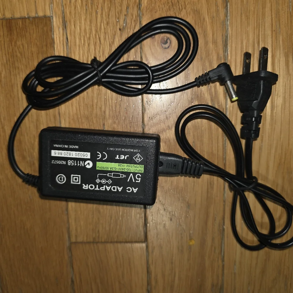 VINTAGE NEW PS VITA SERIES 1000 CHARGER WALL CHARGER POWER ADAPTER OLD STOCK..